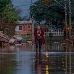 Rua alagada na Vila da Paz após chuvas e novas enchentes